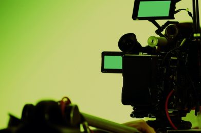 Filmmaker,Crew,Team,With,Professional,Cinema,Equipment,And,Video,Camera