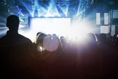 Crowd,At,Concert,-,Cheering,Crowd,In,Front,Of,Bright