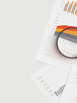 Business,Graphs,,Charts,And,Magnifying,Glass,On,Table.,Financial,Development,