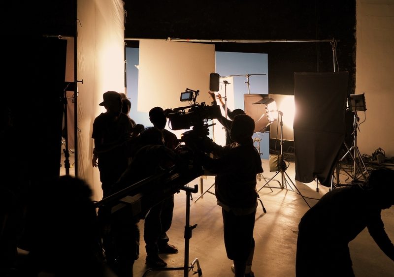 Silhouette,Of,Film,Crews,And,Video,Camera,On,Special,Dolly